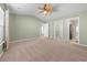Spacious bedroom with neutral tones, carpet flooring, and ample closet space at 4463 Livorn Loop # 4463, Myrtle Beach, SC 29579