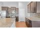 Well-equipped kitchen with stainless steel appliances, stone countertops, backsplash, and plenty of storage space at 4463 Livorn Loop # 4463, Myrtle Beach, SC 29579