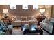 Comfortable living room with stylish decor, including white sofas and decorative lamps at 4463 Livorn Loop # 4463, Myrtle Beach, SC 29579