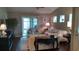 Cozy living room with hardwood floors, comfortable seating, and plenty of natural light at 4463 Livorn Loop # 4463, Myrtle Beach, SC 29579