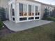 Enclosed patio features large windows and seamless concrete flooring with ample natural light at 4463 Livorn Loop # 4463, Myrtle Beach, SC 29579