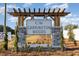 Welcoming entrance sign for Carrington Woods community with stone pillars and landscaping at 544 Duvall St., Longs, SC 29568