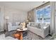Bright living room featuring comfortable sofas, a stylish coffee table, and plenty of natural light at 544 Duvall St., Longs, SC 29568