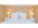 Relaxing bedroom with a queen bed, nightstands, and soft lighting at 6804 N Ocean Blvd. # 1009, Myrtle Beach, SC 29572