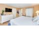 Comfortable bedroom with a queen bed, dresser, and plenty of light at 6804 N Ocean Blvd. # 1009, Myrtle Beach, SC 29572