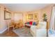 Small dining area with table, chairs and sofa at 6804 N Ocean Blvd. # 1009, Myrtle Beach, SC 29572