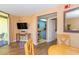 Kitchen and dining area with a table for four at 6804 N Ocean Blvd. # 1009, Myrtle Beach, SC 29572