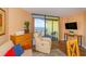 Living room with ocean view and balcony access at 6804 N Ocean Blvd. # 1009, Myrtle Beach, SC 29572