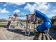 playground with swings, slide, and climbing structure at 6804 N Ocean Blvd. # 1009, Myrtle Beach, SC 29572