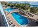 Relaxing pool area with multiple pools and a connecting bridge at 6804 N Ocean Blvd. # 1009, Myrtle Beach, SC 29572