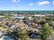 Aerial view of a coastal neighborhood near the ocean, highlighting the community and surrounding commercial areas at 702 Plantation Dr., Surfside Beach, SC 29575
