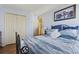 Bright bedroom with hardwood floors, closet, and ensuite entry at 702 Plantation Dr., Surfside Beach, SC 29575