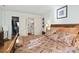 Comfortable main bedroom featuring ensuite bathroom and walk-in closet at 702 Plantation Dr., Surfside Beach, SC 29575