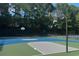 Community basketball court with trees in the background at 8605 Hopper Ct., Myrtle Beach, SC 29579