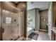 Bathroom featuring a glass shower, soaking tub, and neutral tile flooring at 8605 Hopper Ct., Myrtle Beach, SC 29579