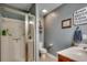 Cozy bathroom featuring a glass shower, neutral tile flooring, and tasteful decorations at 8605 Hopper Ct., Myrtle Beach, SC 29579