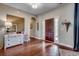 Inviting foyer with hardwood floors, elegant decor, and a stylish front door with sidelights at 8605 Hopper Ct., Myrtle Beach, SC 29579
