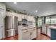 Well-equipped kitchen featuring stainless steel appliances, granite countertops, and ample storage at 8605 Hopper Ct., Myrtle Beach, SC 29579