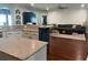 Modern kitchen island with granite countertops, and hardwood floors at 8605 Hopper Ct., Myrtle Beach, SC 29579