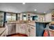 Kitchen sink and island, showing granite countertops and stainless steel appliances at 8605 Hopper Ct., Myrtle Beach, SC 29579