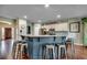 Eat-in kitchen island featuring granite counters, and seating at 8605 Hopper Ct., Myrtle Beach, SC 29579