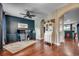 Well decorated home office with hardwood floors, custom desk, and a light color palatte at 8605 Hopper Ct., Myrtle Beach, SC 29579