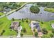 A beautiful aerial shot shows a home with direct access to a waterway and gorgeous landscaping at 1020 Clamour Ct., Conway, SC 29526