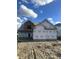 New construction home featuring a charming two-story design with a modern architectural style at 1020 Clamour Ct., Conway, SC 29526