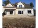 New home construction featuring a covered porch and large sliding glass doors at 1020 Clamour Ct., Conway, SC 29526