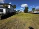 Image displays a spacious grassy yard, fully fenced, in a peaceful residential community. Perfect for outdoor enjoyment at 1020 Clamour Ct., Conway, SC 29526