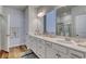 Bright bathroom featuring double sinks, quartz countertop, and glass shower at 134 Hancher Dr., Myrtle Beach, SC 29588