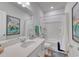 Bathroom features modern vanity, large mirror, and shower-tub combo at 134 Hancher Dr., Myrtle Beach, SC 29588