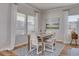 Bright and airy dining area with seating for four and large windows at 134 Hancher Dr., Myrtle Beach, SC 29588