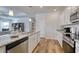 Well-equipped kitchen with stainless steel appliances and granite countertops open to the living room at 134 Hancher Dr., Myrtle Beach, SC 29588