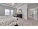A primary bedroom with carpet, ceiling fan and adjoining bath at 134 Hancher Dr., Myrtle Beach, SC 29588