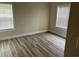 Bedroom with hardwood floors and two windows at 2013 Silvercrest Dr. # 30-A, Myrtle Beach, SC 29579