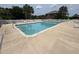 Community swimming pool with lounge chairs at 2013 Silvercrest Dr. # 30-A, Myrtle Beach, SC 29579