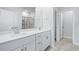 Double vanity bathroom with quartz countertop and large shower at 2040 Copper Creek Loop, Longs, SC 29568