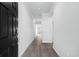 Bright and spacious entryway with dark-stained hardwood floors at 2040 Copper Creek Loop, Longs, SC 29568
