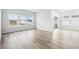 Bright and airy living room with sliding glass doors leading to the backyard at 2040 Copper Creek Loop, Longs, SC 29568