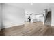 Open concept living room with kitchen and staircase views at 2040 Copper Creek Loop, Longs, SC 29568