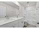 Modern bathroom featuring a double vanity with sleek countertops and a combined tub and shower at 2048 Copper Creek Loop, Longs, SC 29568