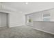 Bonus room featuring light walls, plush gray carpeting, and a view from the windows at 2048 Copper Creek Loop, Longs, SC 29568