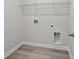 Practical laundry area with essential hookups and clean, simple design ready for appliances at 2048 Copper Creek Loop, Longs, SC 29568