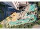 Aerial view showing resort amenities, including pools and playground at 205 74Th Ave. N # 1601, Myrtle Beach, SC 29572