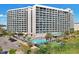 High-rise building with pool and parking area at 205 74Th Ave. N # 1601, Myrtle Beach, SC 29572