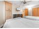 Bright bedroom with two twin beds and wood cabinets at 205 74Th Ave. N # 1601, Myrtle Beach, SC 29572