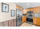 Modern kitchen with granite counters and stainless steel appliances at 205 74Th Ave. N # 1601, Myrtle Beach, SC 29572