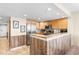 Open concept kitchen with island and breakfast bar at 205 74Th Ave. N # 1601, Myrtle Beach, SC 29572