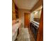 Laundry room with built-in cabinets and modern washer/dryer at 205 74Th Ave. N # 1601, Myrtle Beach, SC 29572
